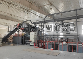 硅微粉自動(dòng)拆包輸送線(xiàn) 自動(dòng)破袋機(jī)工作現(xiàn)場(chǎng)