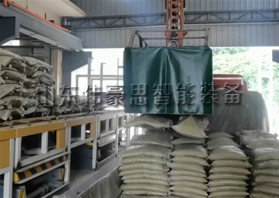 顏料全自動裝車機是怎樣自動完成裝車任務(wù)的？